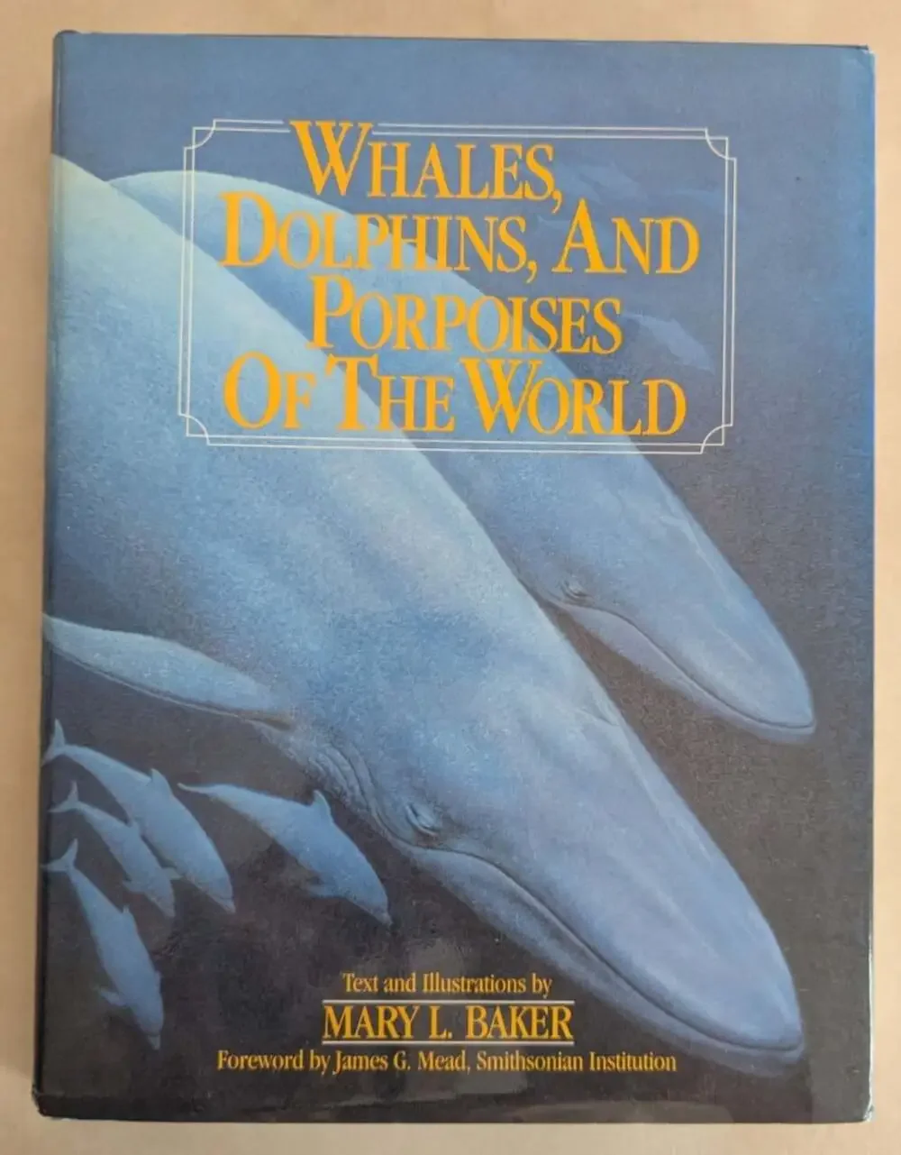 Whales, Dolphins, and Porpoises of the World by Mary L. Baker Hardcover Book